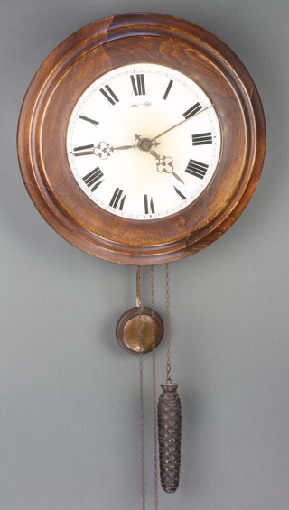 A 19th/20th Century postmans alarm clock, striking on a bell,  with perspex dial and Roman numerals contained in a stained beech case 13 1/2"