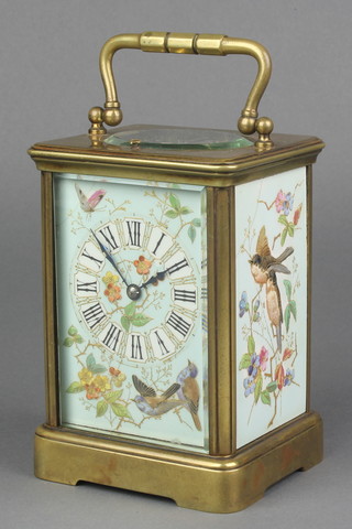 A 19th Century quarter repeating carriage clock striking on a gong, having enamelled panels  decorated birds and flowers 5"h x 3 1/2"w x 3"d 