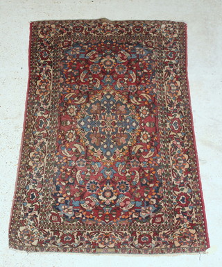 A Persian Isfahan rug with central medallion 79" x 51" 