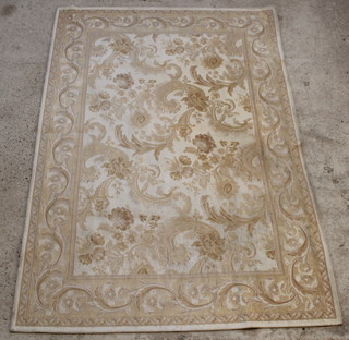 A cream ground Aubusson style rug 94" x 64" 