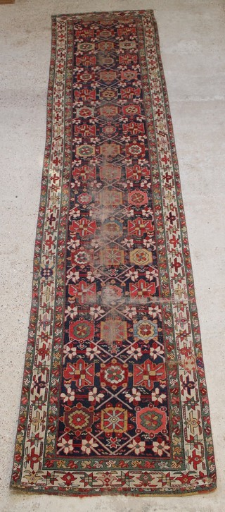 A Caucasian runner with all-over floral design, 170" x 36" 