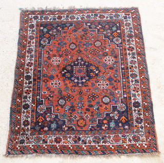 A blue and red ground Persian Qashqai with central medallion 60" x 48" 