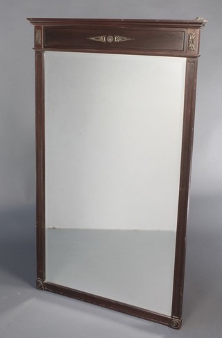A 19th/20th Century Continental rectangular bevelled plate Pier mirror contained in a mahogany and gilt mounted frame 50"h x 30"w 