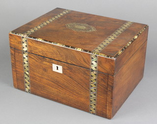 A Victorian inlaid mahogany trinket box with hinged lid and fall front, the drawer from the fall front is missing 