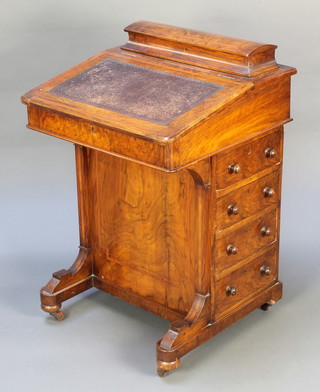 A Victorian figured walnut and crossbanded Davenport desk, the top fitted  a stationery box, the pedestal fitted 4 drawers opposed by dummy drawers 32"h x 22 1/2"w x 22"d 