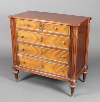 A French Kingwood cocktail cabinet in the form of a commode with hinged lid and fall front, the base fitted a drawer and having fluted columns to the sides, raised on turned supports 29 1/2"h x 16"w 