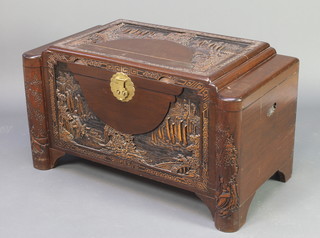 A carved camphor coffer with hinged stepped lid decorated seascape 23"h x 40"w x 21"d 