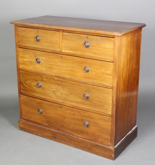 An Edwardian rectangular walnut chest of 2 short and 3 long drawers, raised on a platform base 42"h x 42"w x 18 1/2"d 