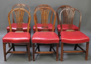 A harlequin set of  6 (4 and 2) mahogany Hepplewhite style dining chairs with pierced vase shaped slat backs, the seats upholstered in red material, raised on square tapered supports with H framed stretchers 
