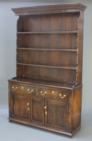 An 18th Century oak dresser, the later associated raised back with moulded cornice and 3 shelves above 2 long drawers with double cupboard 86"h x 53" x 17"d  