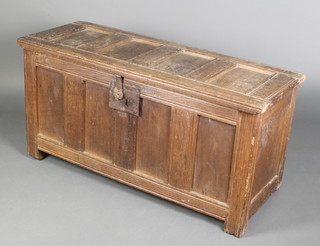 A 17th/18th Century oak coffer of panelled construction with hinged lid and iron lock 24"h x 48"w x 18"d 