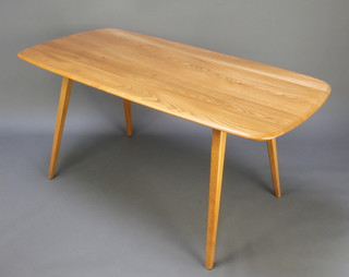 An Ercol light elm dining table, the top of plank construction, raised on outswept supports 28"h x 60"l x 30"w 