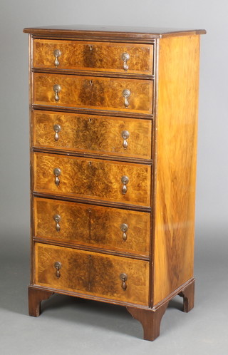 A Queen Anne style figured walnut and crossbanded chest of 6 drawers with feather and crossbanding, raised on bracket feet 48"h x 24"w x 17"d 