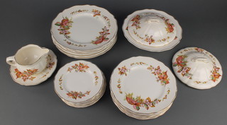 A Royal Doulton Wilton pattern part dinner service comprising 9 small plates, 9 medium plates, 8 large plates, tureen and lid, a spare lid and stand 