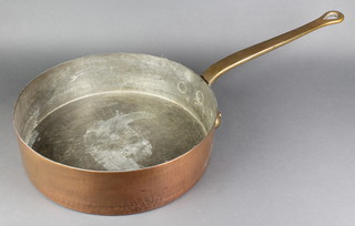An Helvetia copper and brass frying pan 4"h x 14" diam. 