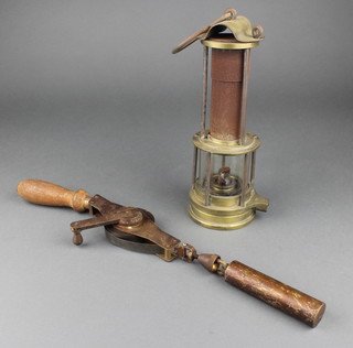 A Thomas & William miner's flame safety lamp, a Raybone Military issue 30ft tape measure with crows foot and marked 1975 