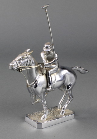 A Lejeune chrome car mascot in the form of a polo player 7" x 6" x 1 1/2" 