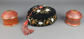A Victorian black embroidered velvet smoking hat together with a pair of cylindrical Persian string boxes 3" 