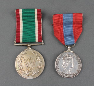 An Elizabeth II issue Imperial Service medal to Leonard Hill Messenger together with a Women's Voluntary Service Long Service Good Conduct medal 