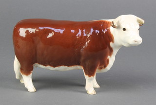 A Beswick figure -  Hereford cow 1360 4 1/4"  