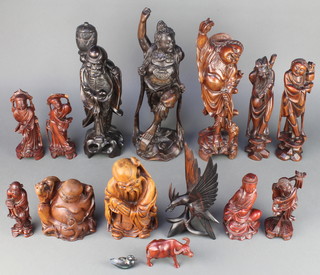 2 Eastern carved hardwood figures inset metal 14" and 13" and 12 other carved figures
