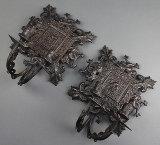 A pair of 19th Century embossed bronze twin light girandoles decorated dolphins 8" x 7 1/2" 
