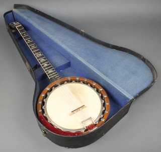 Barnes & Mullins of London, a 6 stringed banjo contained in an inlaid figured walnut case, complete with fibre carrying case 
