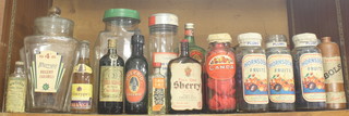 A Murray's Regent Caramel glass biscuit jar, a Grants Morella cherry brandy bottle, 3 Horndean fruits bottles and various other bottles 