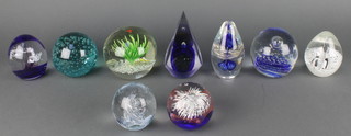 A collection of 9 20th Century paperweights