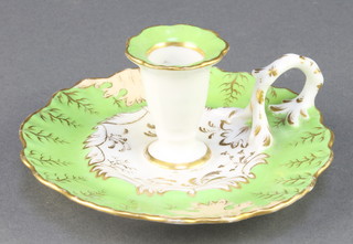 An 19th Century porcelain chamberstick with green and gilt decoration 5" 