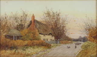 E Walton, a pair of watercolours signed, "Near Bramley Surrey" figures before thatched cottages 8" x 13" 