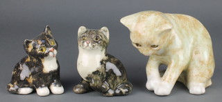 A Jenny Winstanley figure of a seated cat with glass eyes 6" and 2 smaller ditto 4" 