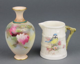 A Royal Worcester baluster vase decorated with roses 3 3/4" and a ditto jug decorated with a blue tit signed H Powell 2 1/2" 