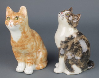 A Jenny Winstanley figure of a seated cat with glass eyes 9 1/2", a 2 colour ditto 9 1/2" 