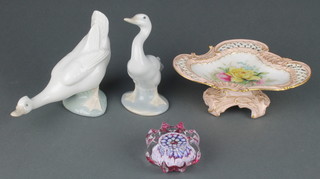 A Worcester dish on raised support with pierced decoration painted Spring flowers 6" together with 2 Lladro ducks and a contemporary glass paperweight