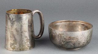 A silver mug and bowl with presentation inscription Birmingham 1922 