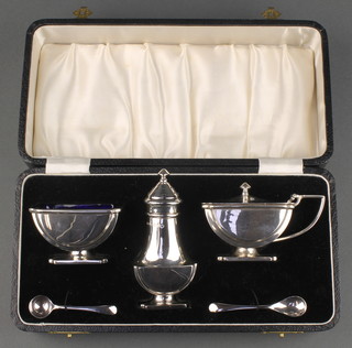 An Art Deco silver 3 piece condiment set with 2 spoons Maker I S Greenberg & Co Birmingham 1935 165 grams