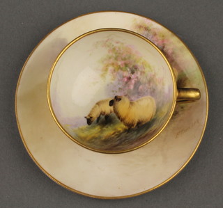 A Royal Worcester tea cup and saucer decorated with sheep signed A Barker