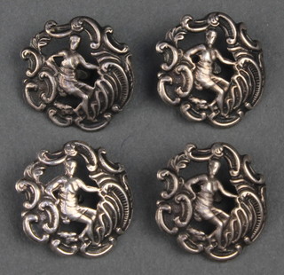 A set of 4 Edwardian silver buttons with figure and scroll decoration Birmingham 1902 