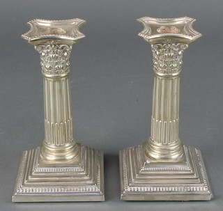A pair of Edwardian silver plated Corinthian column dwarf candlesticks 6 1/2" 