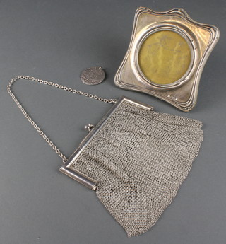 An 800 standard mesh purse, a photograph frame and medallion 