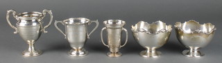 A pair of silver miniature rose bowls with fancy rims, Birmingham 1937, 3 ditto trophy cups, 380 grams