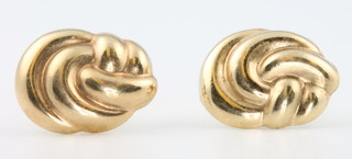 A pair of 9ct yellow gold whorl earrings 