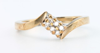 A 9ct yellow gold diamond ring, size K 1/2