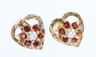 A pair of 9ct yellow gold heart shaped pearl and garnet earrings