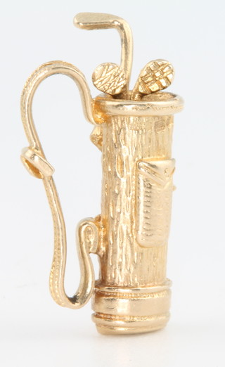 A 9ct yellow gold novelty charm in the form of a bag of golf clubs 4.3grams 