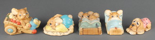 A Pendelfin figure group of 2 rabbits in bed and 4 others 
