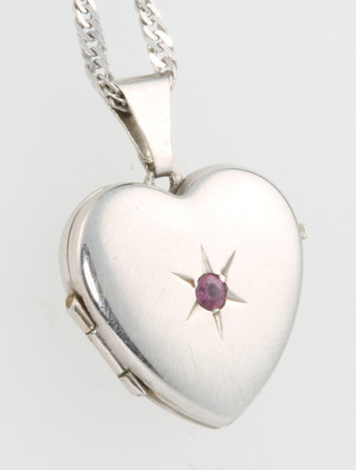 A 9ct white gold necklace with ditto gem set heart shaped locket 3.6 grams