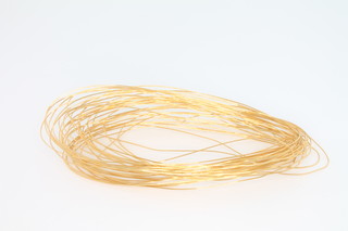 A coil of 24ct yellow gold wire, tested and verified approx. 16 grams