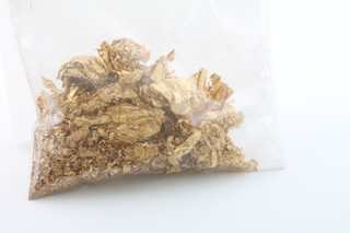 A quantity of 24ct yellow gold grains tested and verified approx. 26 grams 